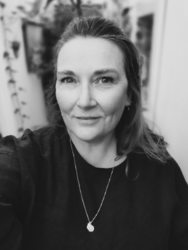 Where the light unpicks the seam of the sky